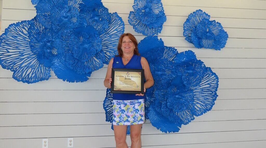 Aruba Tourism Authority Honors Loyal Visitor Ms. Linda Alberque at Divi Aruba Phoenix Beach Resort