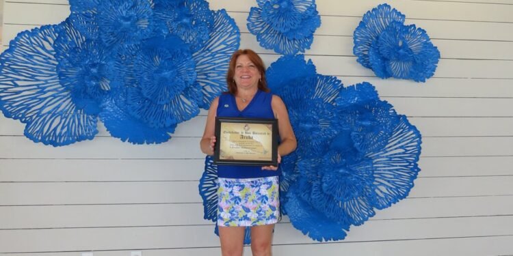 Aruba Tourism Authority Honors Loyal Visitor Ms. Linda Alberque at Divi Aruba Phoenix Beach Resort