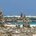 Aruba Birdlife Conservation Warns Against Harmful Rock Stacking at Baby Beach