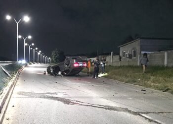 BMW Overturns on WVB Boulevard, Lands Upside Down in Middle of the Road