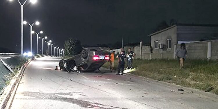 BMW Overturns on WVB Boulevard, Lands Upside Down in Middle of the Road