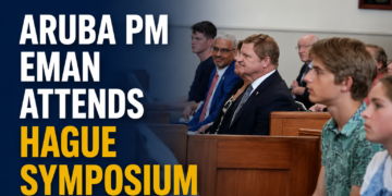 Aruba PM Eman Attends Hague Symposium