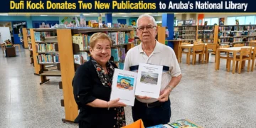 Dufi Kock Donates Two New Publications to Aruba's National Library dufi kock donates
