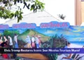 Elvis Tromp Restores Iconic San Nicolas Tourism Mural