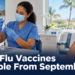 Healthcare worker preparing an influenza vaccine at an Aruba clinic