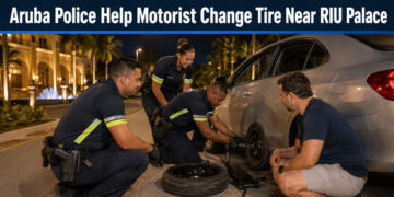 Aruba Police Help Motorist Change Tire Near RIU Palace
