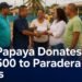 Community donation presentation after the Copa Papaya bolas tournament