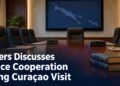 Aruba and Curaçao flags representing a justice cooperation meeting