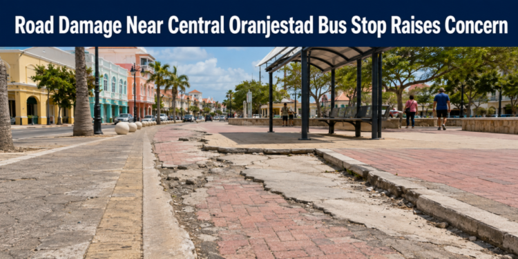 Road Damage Near Central Oranjestad Bus Stop Raises Concern