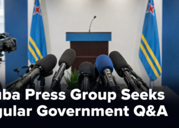 Microphones in an Aruba press room representing a request for regular government questions