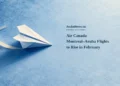 Conceptual cyanotype-style editorial illustration of a generic folded paper airplane on icy-blue paper, with the headline Air Canada Montreal–Aruba Flights to Rise in February and ArubaNews.ca branding.