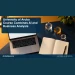 Conceptual editorial illustration: Overhead conceptual still life of an unbranded laptop with a completely blank screen, blank financial-analysis notebook and small transparent geometric blocks on a navy and amber study desk. No charts, digits, text, logos, people or actual university classroom. Not a photograph of the reported people or event.