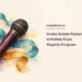 Conceptual watercolor editorial illustration of a plum-coloured microphone with turquoise and ochre ribbons, with the headline Aruba Artists Feature in Keinta Kaya Regatta Program and ArubaNews.ca branding.
