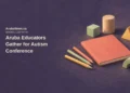 Conceptual editorial illustration of unmarked learning materials, pencils and simple geometric blocks on a table; not the actual autism conference or a depiction of an autistic child.