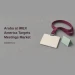 Conceptual editorial illustration of a blank conference badge on a burgundy lanyard beside a mint tent card, with the headline Aruba at IMEX America Targets Meetings Market and ArubaNews.ca branding.