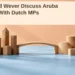 Croes and Wever Discuss Aruba Projects With Dutch MPs Conceptual editorial illustration of abstract wooden blocks connected by a small bridge, with the Croes and Wever meeting headline and ArubaNews.ca branding; not a proposed building design.