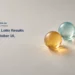 Conceptual still life of three unmarked amber, turquoise and clear glass spheres; not official lottery balls, equipment or winning-number evidence.