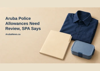 Conceptual editorial illustration of a neatly folded unbranded navy work shirt beside a blank benefits folder and a simple lunch container on a light desk, with the article headline and ArubaNews.ca branding.
