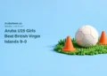 Conceptual editorial illustration of an unbranded football and training cones on a stylized patch of grass; not a photograph of the players or the British Virgin Islands match.