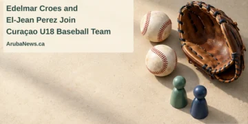 Conceptual editorial illustration of two baseballs, an empty glove and two plain wooden player markers on a sandy tabletop, with the article headline and ArubaNews.ca branding.