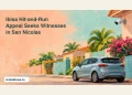 Ibisa Hit-and-Run Appeal Seeks Witnesses in San Nicolas Conceptual editorial illustration of an undamaged parked car and a home security camera on a quiet tropical residential street; no actual incident is depicted.