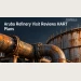 Editorial illustration of weathered industrial pipes and steel infrastructure; not the actual refinery visit.