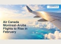 Air Canada Montreal–Aruba Flights to Rise in February Editorial illustration of an anonymous aircraft wing above sunlit clouds and blue sea.