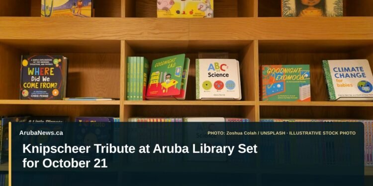 Knipscheer Tribute at Aruba Library Set for October 21 Illustrative stock photo for “Knipscheer Tribute at Aruba Library Set for October 21”: Children’s books arranged on library shelves. Photo by Zoshua Colah via Unsplash; not a photograph of the specific event. Headline and ArubaNews.ca branding appear in a lower-third news tile.