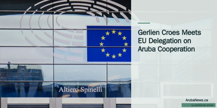 Illustrative stock photograph for “Gerlien Croes Meets EU Delegation on Aruba Cooperation”: European Union flag on building; illustrative cooperation stock, not the delegation. Photograph by Natalie Dunn via Unsplash. This is not a photograph of the specific Aruba news event.