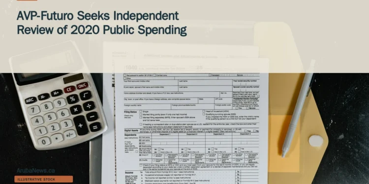 Illustrative stock photograph for “AVP-Futuro Seeks Independent Review of 2020 Public Spending”: Calculator and tax forms on a dark surface; illustrative stock, not Aruba government records. Photograph by Kelly Sikkema via Unsplash. This is not a photograph of the specific Aruba news event.