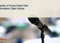 Illustrative stock photograph for “University of Aruba Hosts Free Toastmasters Open House”: Microphone in an empty room; illustrative, not the Toastmasters event. Photograph by Clint Patterson via Unsplash. This is not a photograph of the specific Aruba news event.
