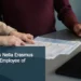 Illustrative stock photograph for “HOH Names Nella Erasmus September Employee of the Month”: Two professionals reviewing paperwork at a conference table during a business meeting in San Francisco. Photograph by Olena Kholina via Unsplash. This is not a photograph of the specific Aruba news event.