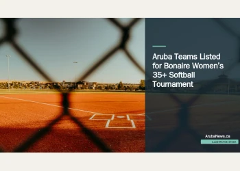 Illustrative stock photograph for “Aruba Teams Listed for Bonaire Women’s 35+ Softball Tournament”: Baseball field seen through a chain-link fence Photograph by Emmanuel Munoz via Unsplash. This is not a photograph of the specific Aruba news event.