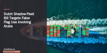 Dutch Shadow-Fleet Bill Targets False Flag Use Involving Aruba Illustrative stock photograph for “Dutch Shadow-Fleet Bill Targets False Flag Use Involving Aruba”: Colorful cargo ship headed out to see aerial Photograph by Venti Views via Unsplash. This is not a photograph of the specific Aruba news event.