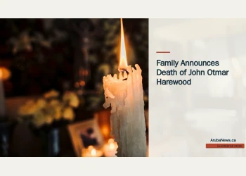 Illustrative stock photograph for “Family Announces Death of John Otmar Harewood”: Candles at a funeral Photograph by Diego Lozano via Unsplash. This is not a photograph of the specific Aruba news event.