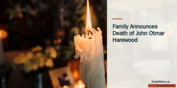 Illustrative stock photograph for “Family Announces Death of John Otmar Harewood”: Candles at a funeral Photograph by Diego Lozano via Unsplash. This is not a photograph of the specific Aruba news event.