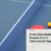 Illustrative stock photograph for “Aruba Doet Beats Casa Rosada 3–2 in Table-Tennis Playoff”: two ping pong paddles and a ping pong ball on a blue table Photograph by Inkiipow via Unsplash. This is not a photograph of the specific Aruba news event.