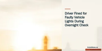 Illustrative stock photograph for “Driver Fined for Faulty Vehicle Lights During Overnight Check”: Police vehicle on road; illustrative stock, not the actual vehicle check. Photograph by Riccardo Manieri via Unsplash. This is not a photograph of the specific Aruba news event.