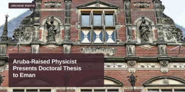 Aruba-Raised Physicist Presents Doctoral Thesis to Eman The main building of the University of Groningen; archive photo, not a photograph of the thesis presentation or researcher.