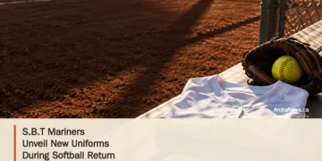 Conceptual editorial illustration of an unbranded softball jersey, glove and ball on a dugout bench; not a photograph of the S.B.T Mariners.