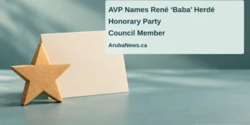 AVP Names René ‘Baba’ Herdé Honorary Party Council Member Conceptual illustration of a plain wooden star beside a blank presentation card on a teal tabletop, not an actual party award, with the article headline and ArubaNews.ca branding; no portrait or documentary scene.
