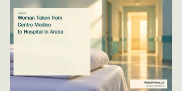 Woman Taken from Centro Medico to Hospital in Aruba Conceptual editorial illustration of a folded blanket and softly lit medical corridor; not a photograph of Centro Medico or the patient.