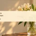 Conceptual editorial illustration; pale cream flowers in a simple glass vase beside a softly lit window, warm late-afternoon light, delicate sage and ivory palette, off-center composition with spacious negative space. Not a documentary image of the reported event.
