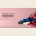 Conceptual editorial still life of an unbranded microphone, closed notebook and blue and raspberry fabrics on a pink surface, with the Elizabeth Johnson headline and ArubaNews.ca branding; not a photograph of Johnson or an actual briefing.