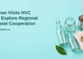 Conceptual editorial illustration of sorted recyclable glass, cardboard and a metal can, not an actual HVC facility or proposed plant, with the regional waste cooperation headline and ArubaNews.ca branding.