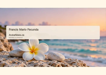 Conceptual editorial illustration; a single white flower and smooth pale stones near a softly blurred Caribbean shoreline, gentle dawn light, muted cream and blue colors, wide minimal composition. Not a documentary image of the reported event.