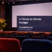 Conceptual editorial illustration of an empty screening space and microphone, not the documentary or the actual venue.