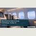 Conceptual editorial illustration of an empty generic premium aircraft cabin with broad seats and soft blue window light, no airline logos, exact aircraft configuration or people; not a documentary photograph of the people, venue or event.