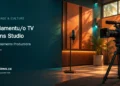 Conceptual editorial illustration of an empty television production studio with a microphone and camera; not a photograph of the Papiamentu/o TV facilities.