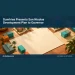 Conceptual editorial illustration: Conceptual planning table with blank cream paper, simple colored blocks and small generic Caribbean houses, warm terracotta and turquoise, overhead view, not an actual proposed project design, no lettering or logos. Not a photograph of the actual event, people or location.